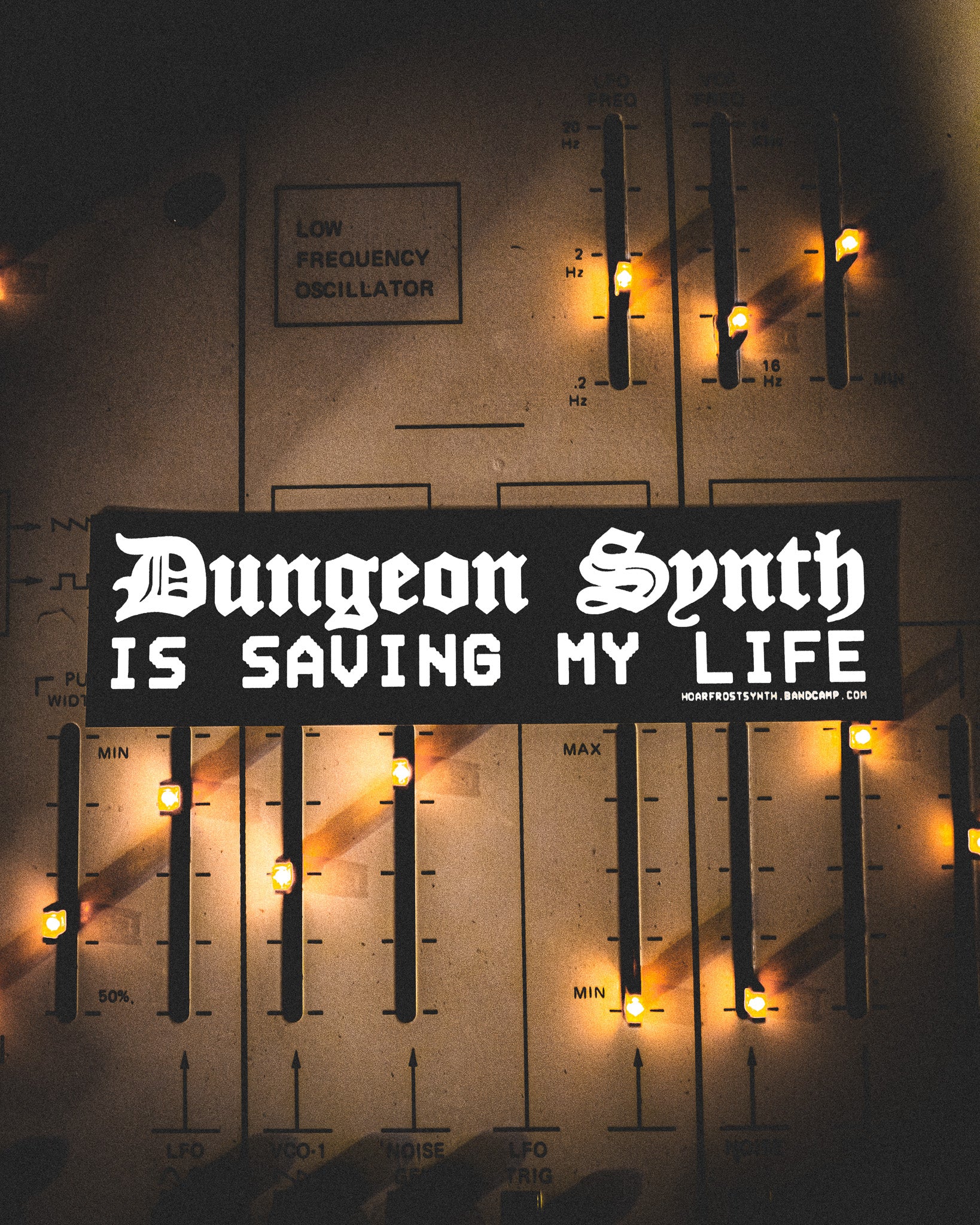 Vintage synthesizer with 'Dungeon Synth IS SAVING MY LIFE' by Nick Filth
